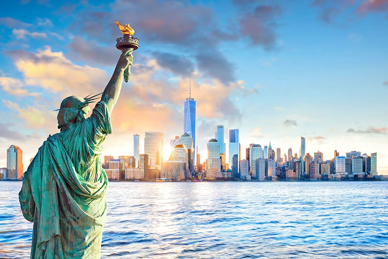 AdobeStock_209705558 New York City skyline and Statue of Liberty